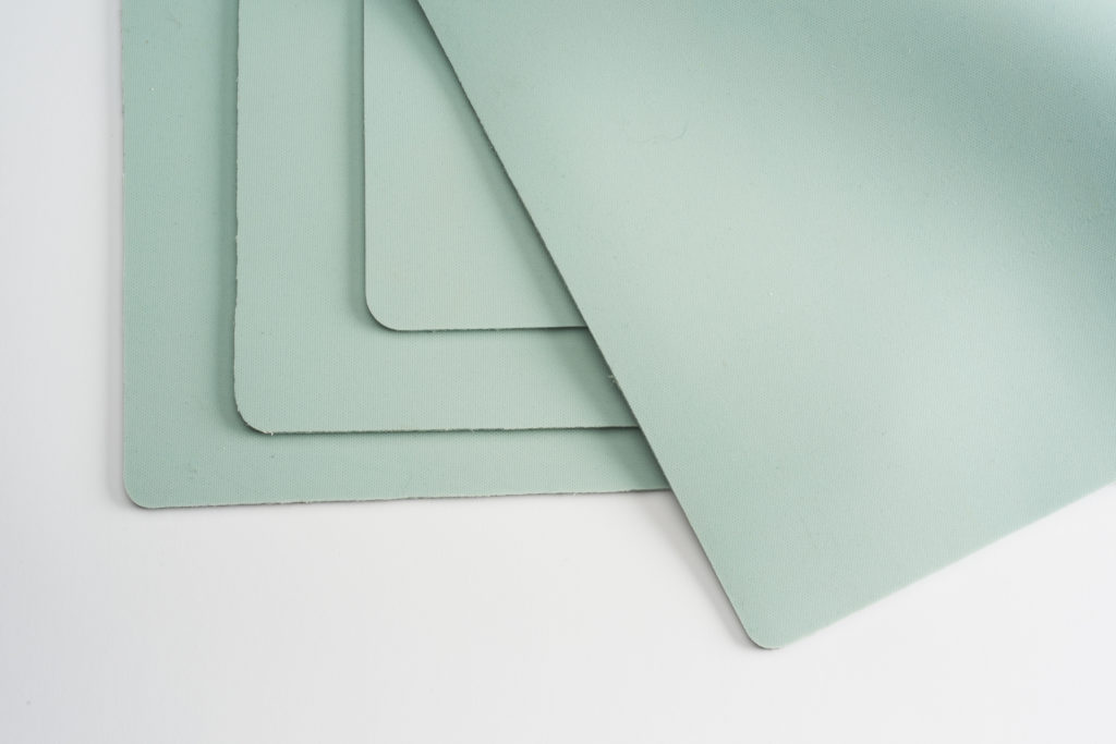 Essentialware’s Green Silicone Rubber Heat Conductive Pads are used to help evenly distribute pressure and protect materials in the sublimation process.